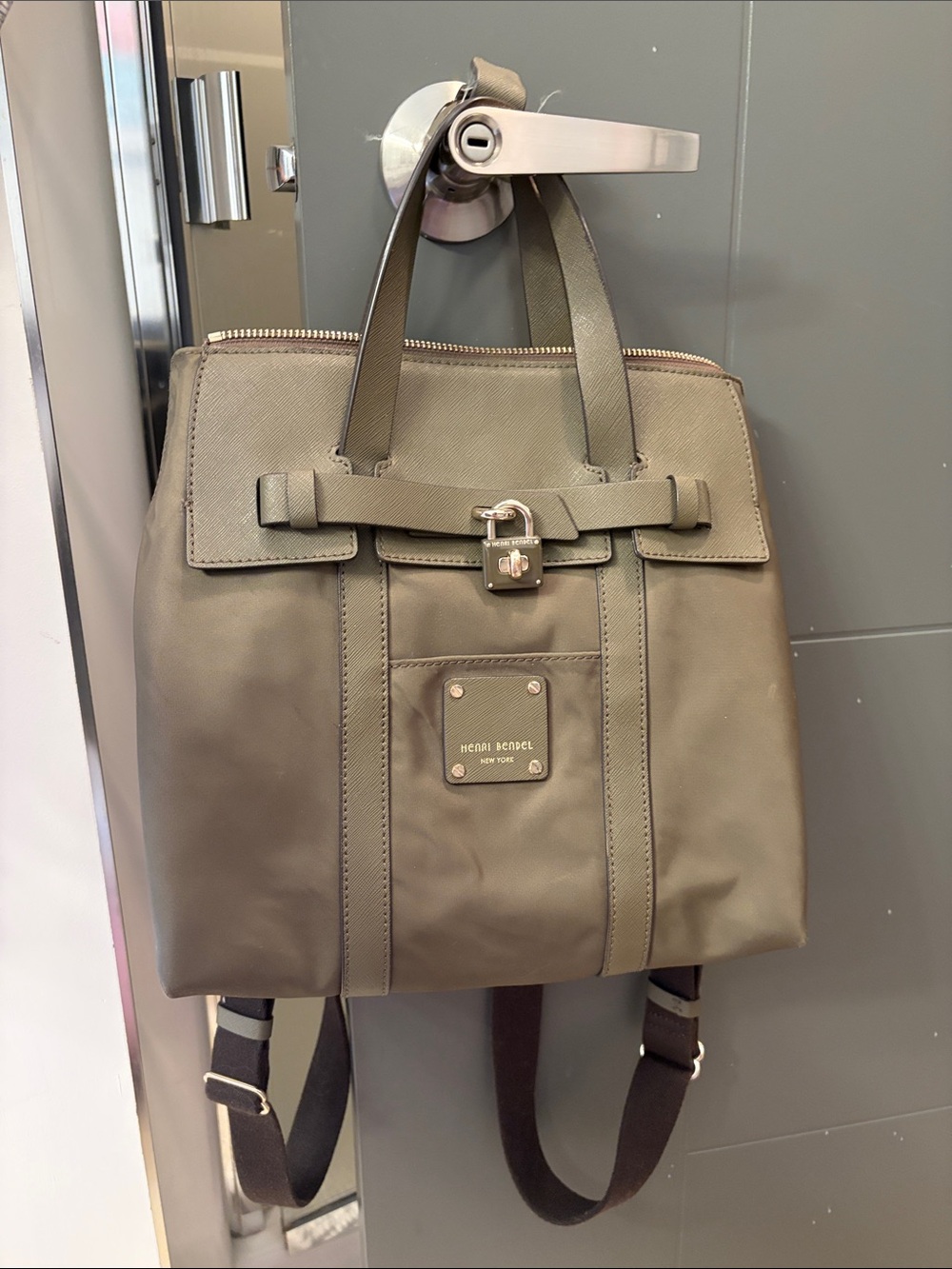 henri bendel olive green Jetsetter convertible backpack with top handles